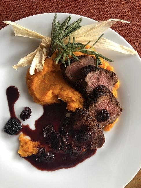 Spice Cured Elk Tenderloin with a Dried Cherry Sauce and Sweet Potato Mash